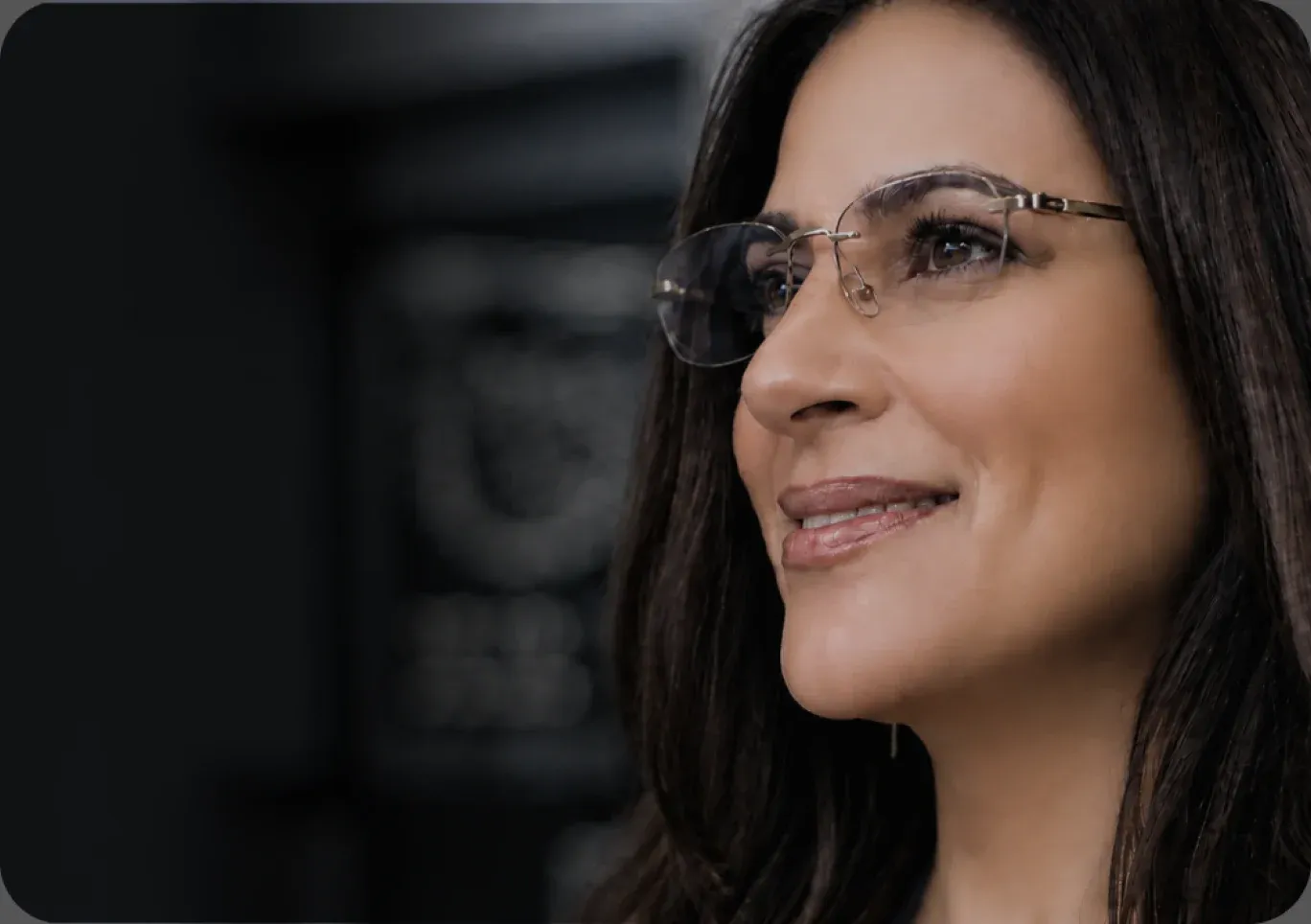 Woman wearing Neurolens eyeglasses