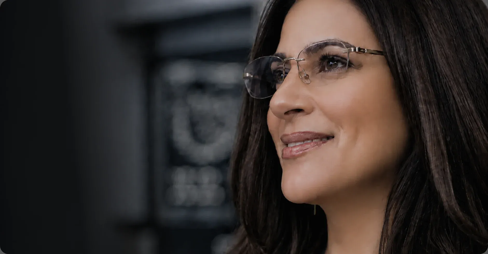 Woman wearing Neurolens eyeglasses